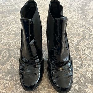 Tod’s Black Patent Leather Hi Heel Ankle Boots. Stretch panel. Rubber tread.